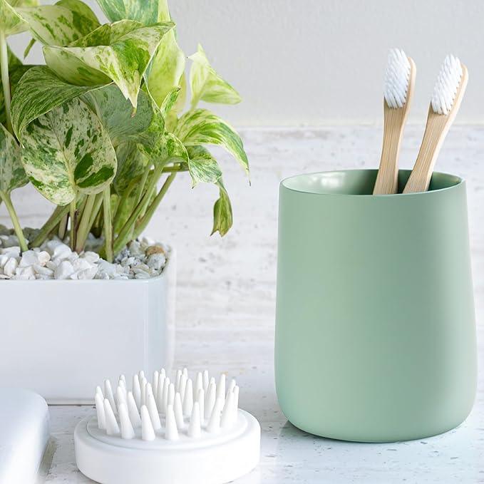 Yew Design Matte Sage Green Toothbrush and Toothpaste Holder and Cup for Bathroom Vanity and Countertop, Round Organizer for Electric Toothbrushes, Floss, Razors, Cotton, and Mouthwash - ModernBath