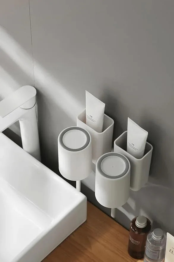 FLAUVEL Wall-Mounted Toothbrush and Toothpaste Holder - Self-Draining Design, Easy Installation, Space-Saving, White (Single - One Normal Cup) - ModernBath