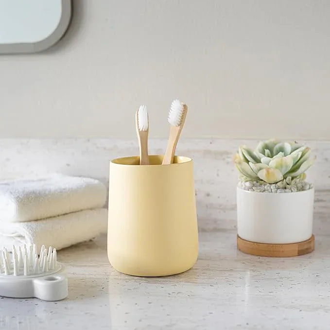 Yew Design Matte Yellow Cream Toothbrush and Toothpaste Holder and Cup for Bathroom Vanity and Countertop, Round Organizer for Electric Toothbrushes, Floss, Razors, Cotton, and Mouthwash - ModernBath