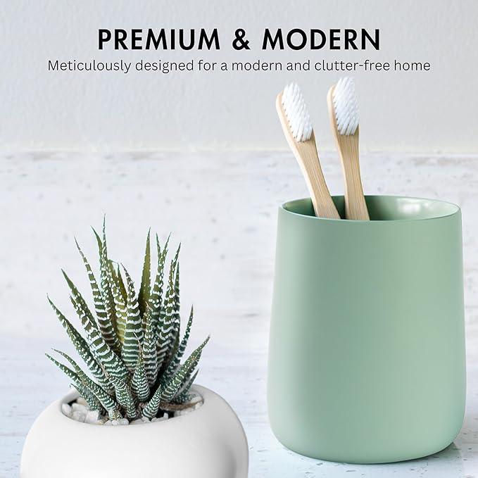 Yew Design Matte Sage Green Toothbrush and Toothpaste Holder and Cup for Bathroom Vanity and Countertop, Round Organizer for Electric Toothbrushes, Floss, Razors, Cotton, and Mouthwash - ModernBath